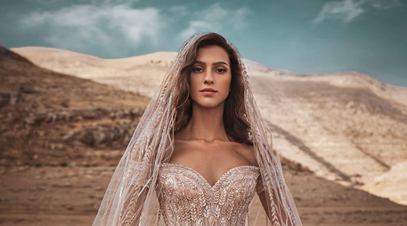 Zuhair Murad Fall 2021 bridal collection symmetrical drawn over strapless ball gown featured in Perfect Wedding Magazine